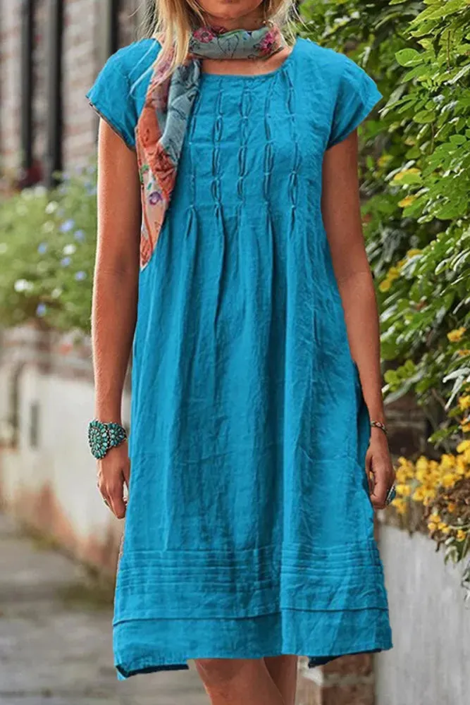 Neve - Short-sleeved leisure dress with U-neck in plain patchwork